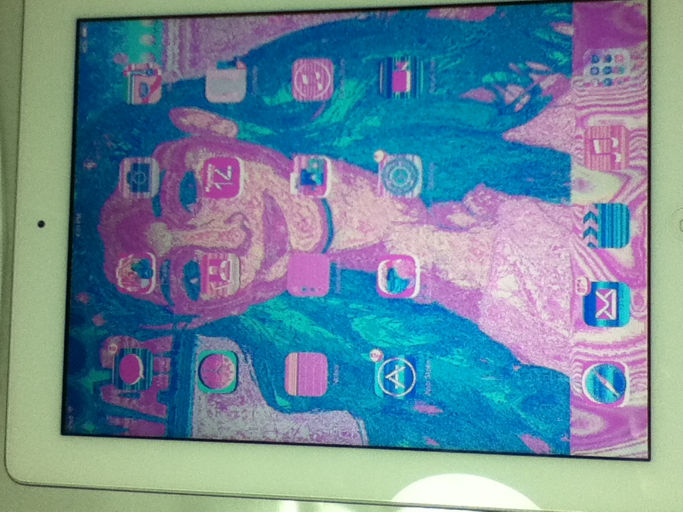 My iPad Screen is blue green and pink Apple Community