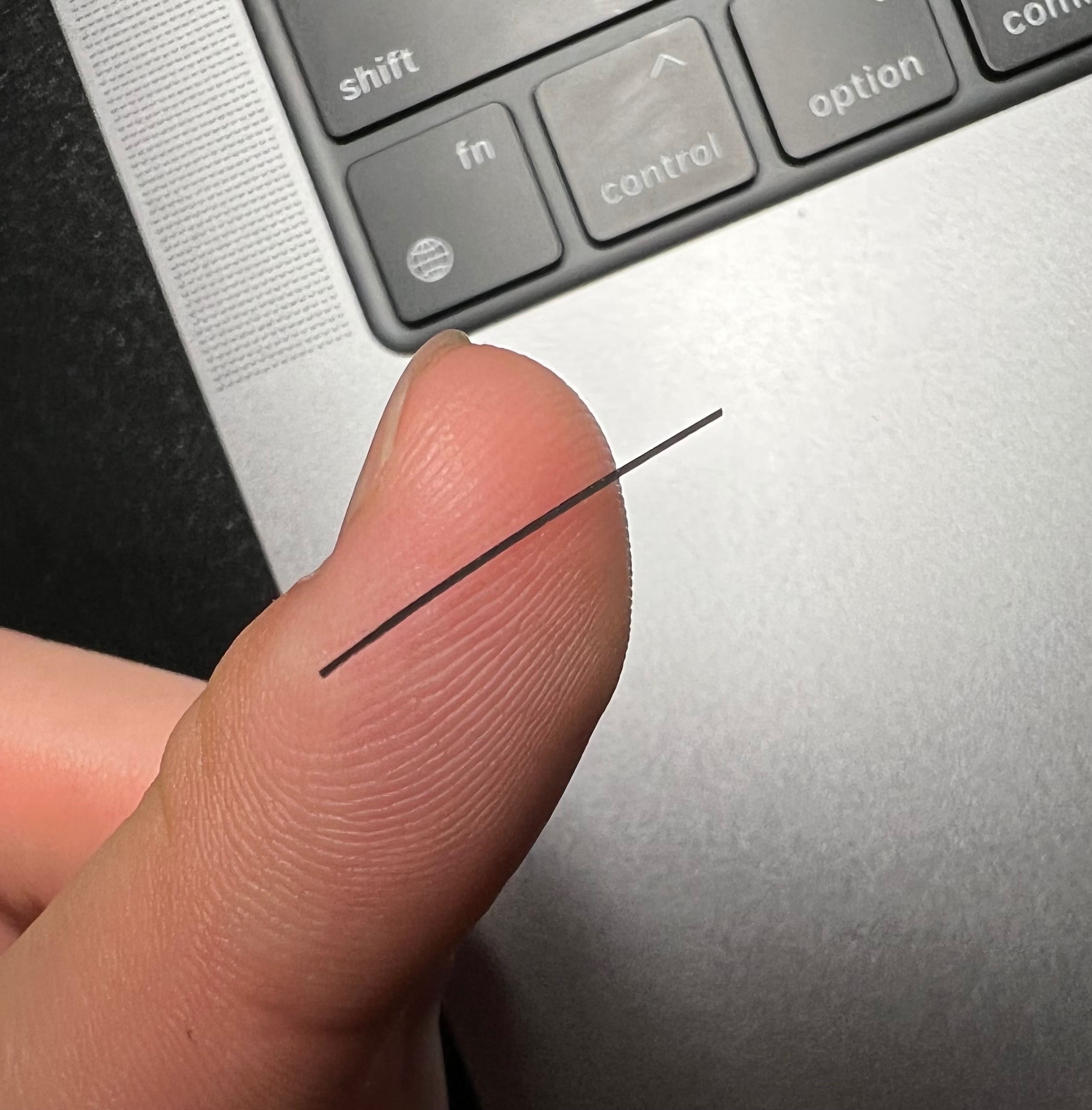 Thin Plastic Strips Peeling from MacBook Apple Community