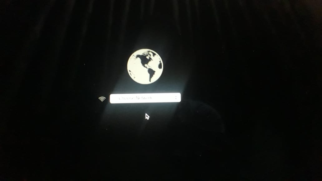 Stuck at spinning globe Apple Community