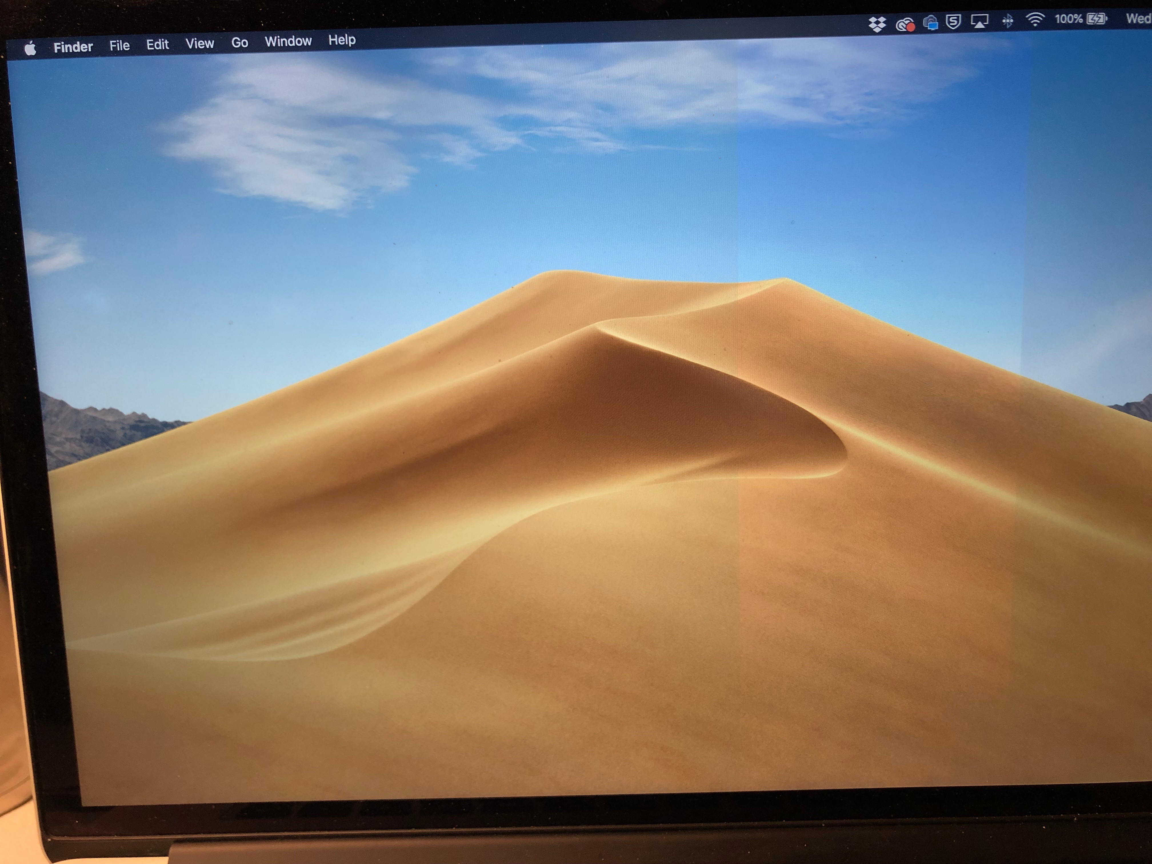 apple macbook bottom left screen background