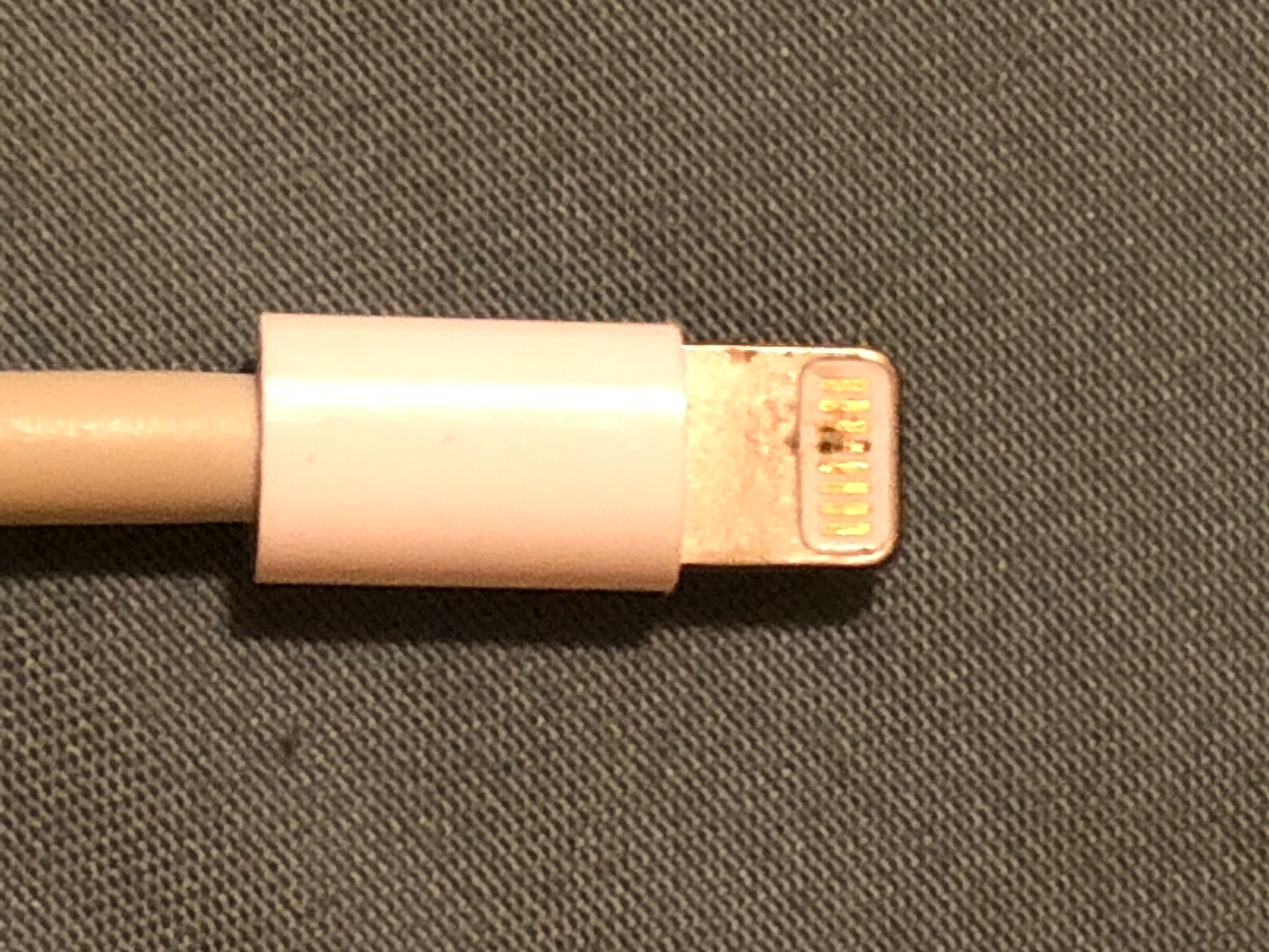 Burnt power pin on lightning cord Apple Community