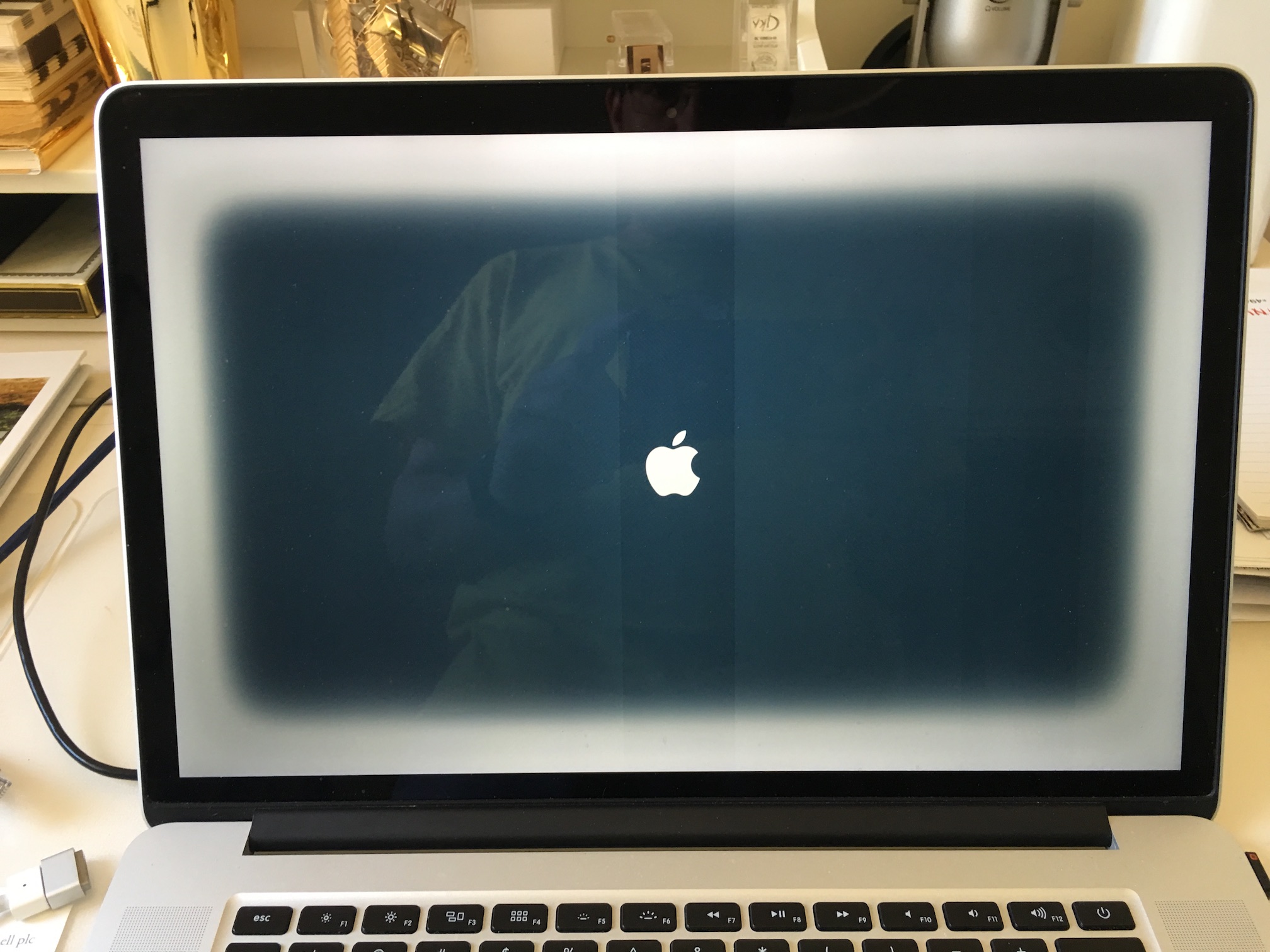 Translucent grey border on screen that de… - Apple Community