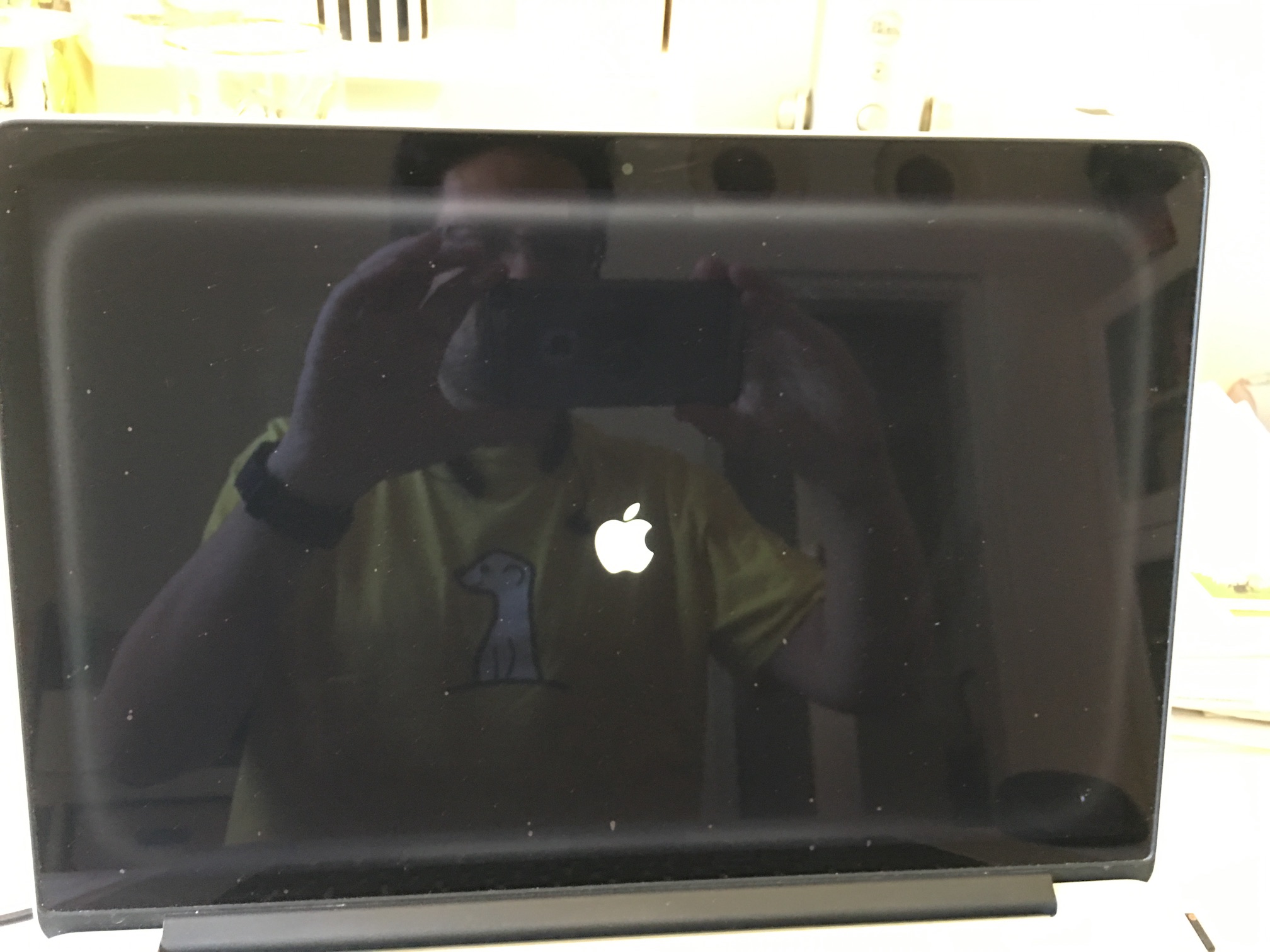 Translucent grey border on screen that de… Apple Community