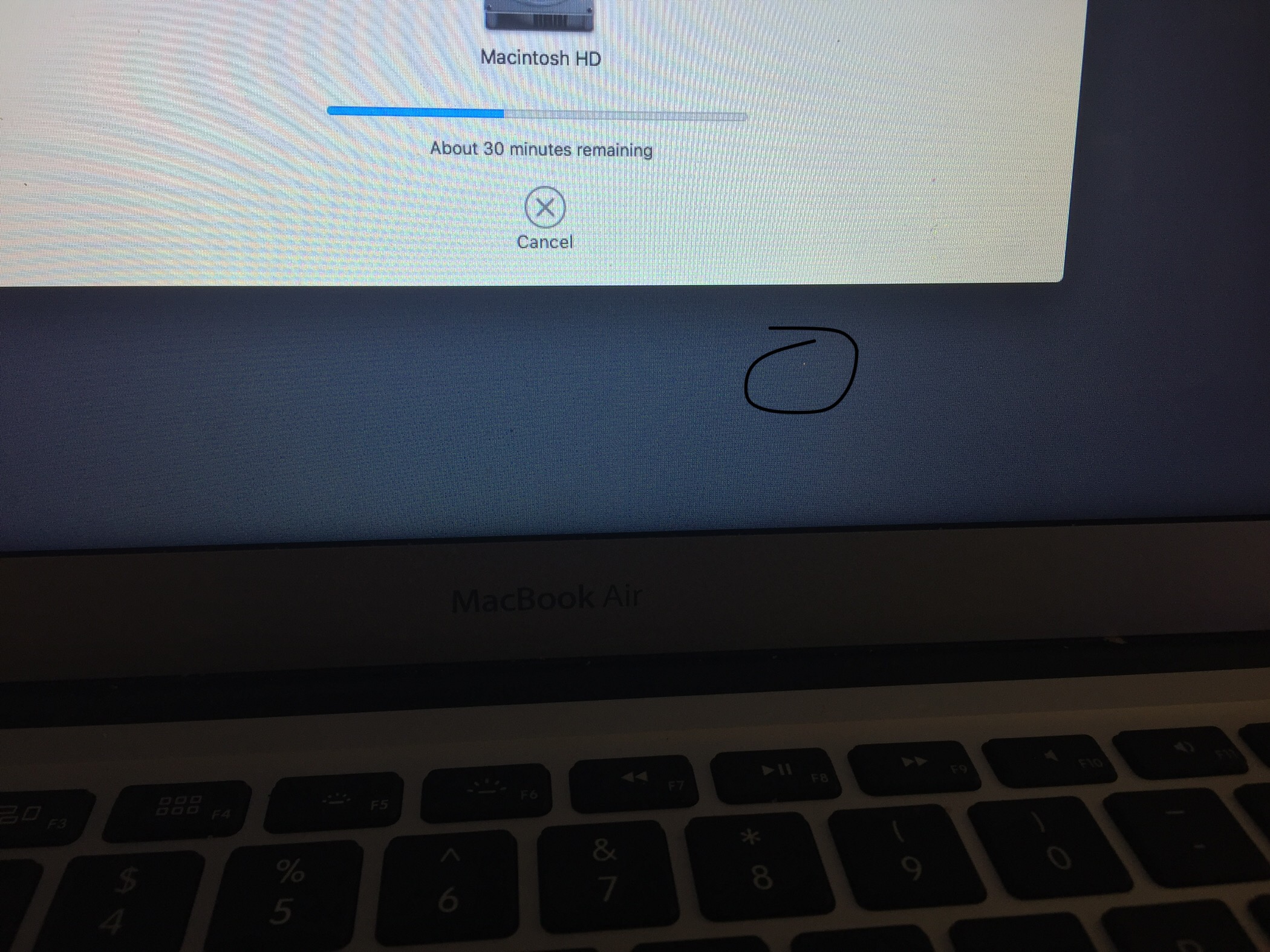 My MacBook has a red dot on the… - Apple Community