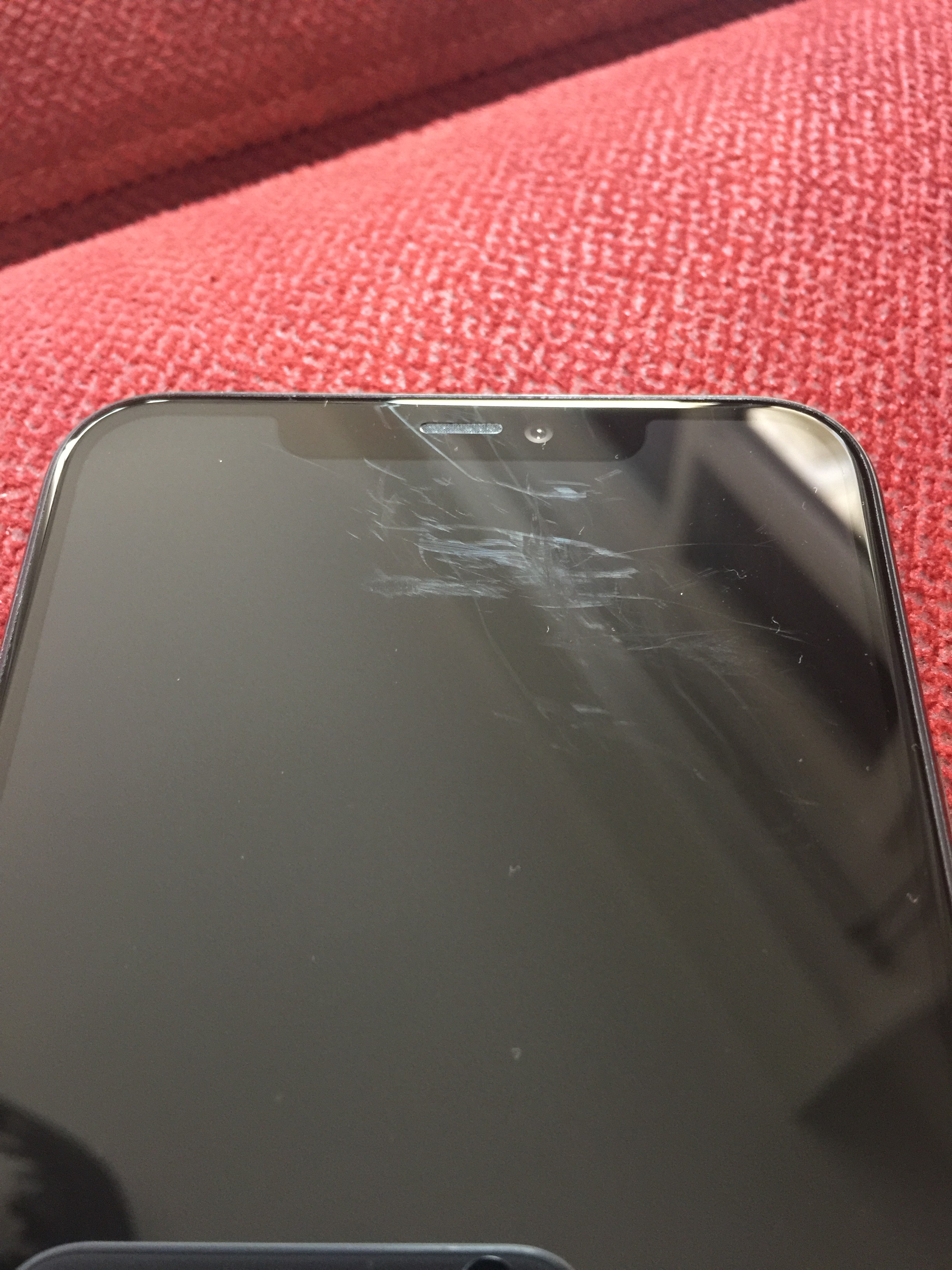 My iPhone 11 has 4 deep scratches on the screen. I don't know why.